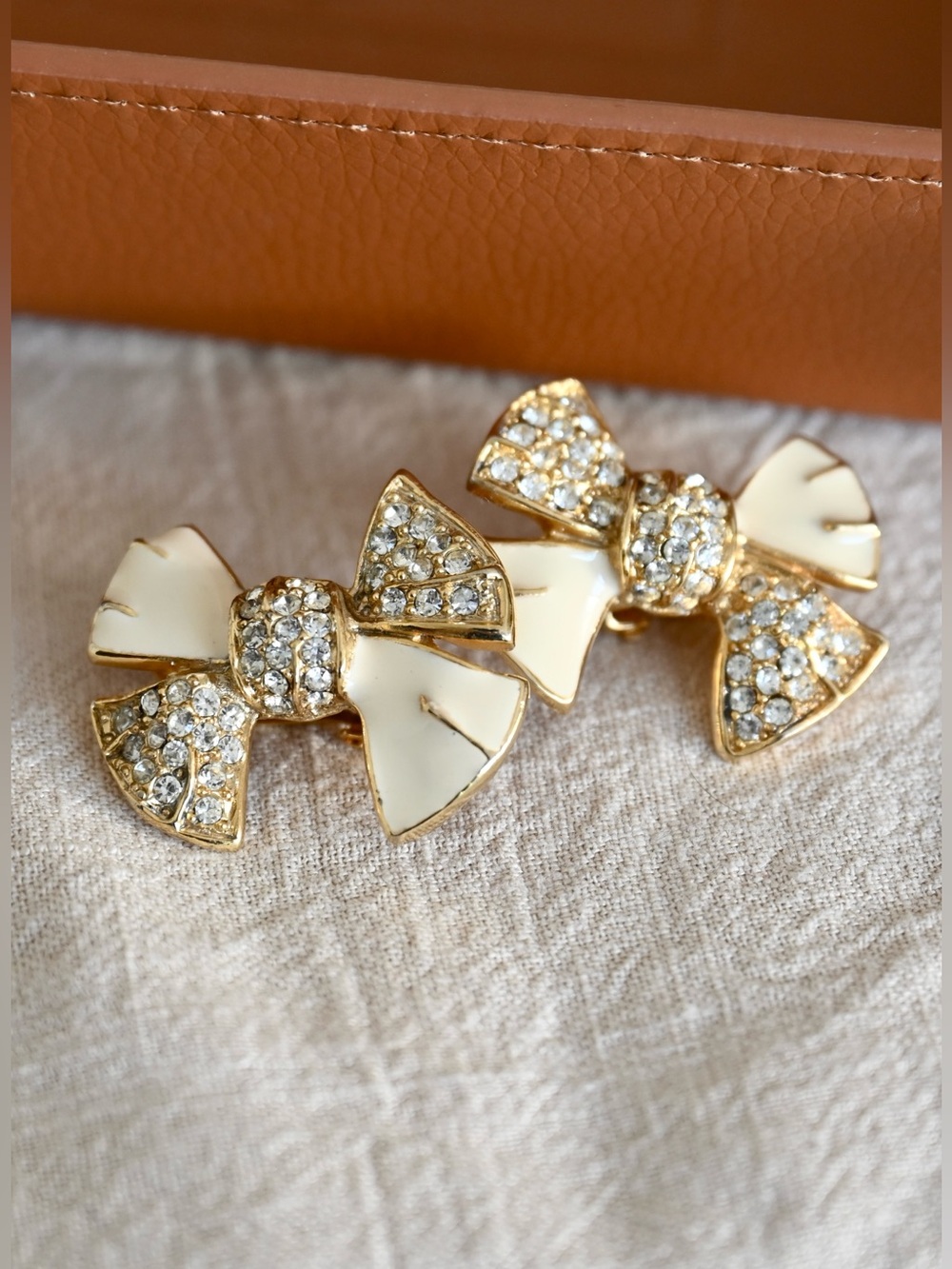 Authentic Vintage Givenchy Bow Tie Knot White Enamel Stone Gold Clip-On Earrings